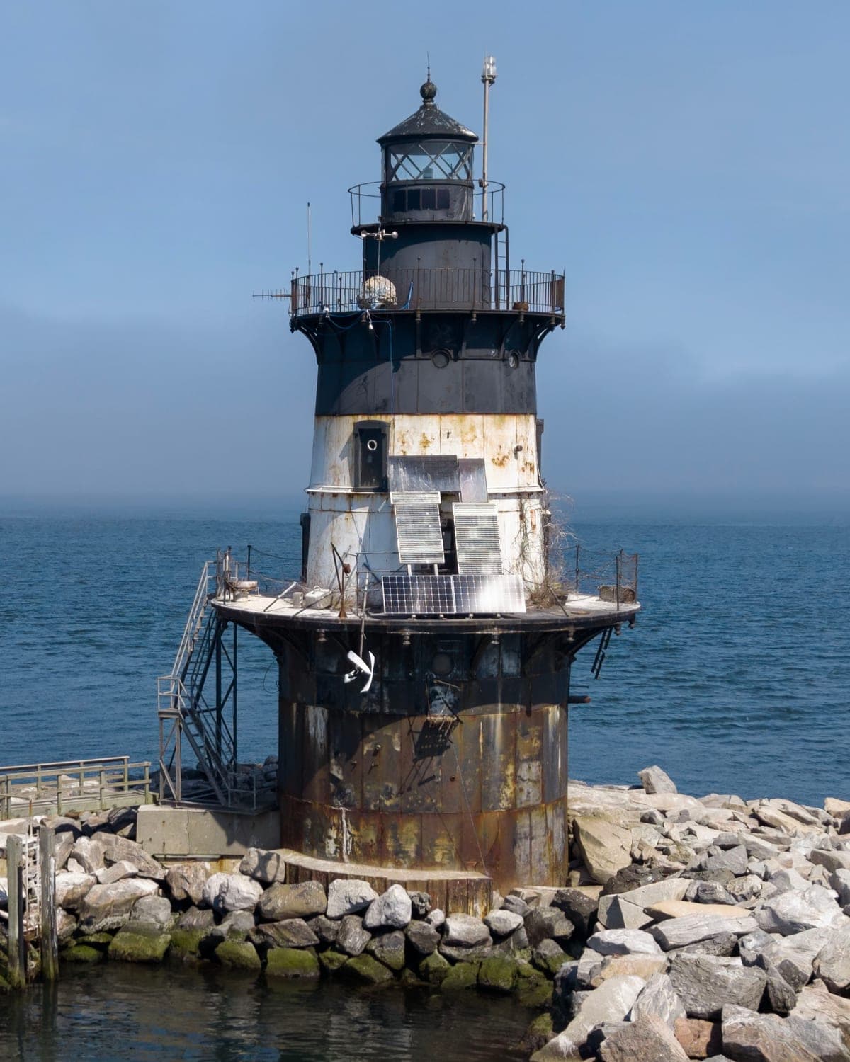 Orient Point Light, a sparkplug lighthouse off Orient Point, New York in the Plum Gut of Long Island Sound.