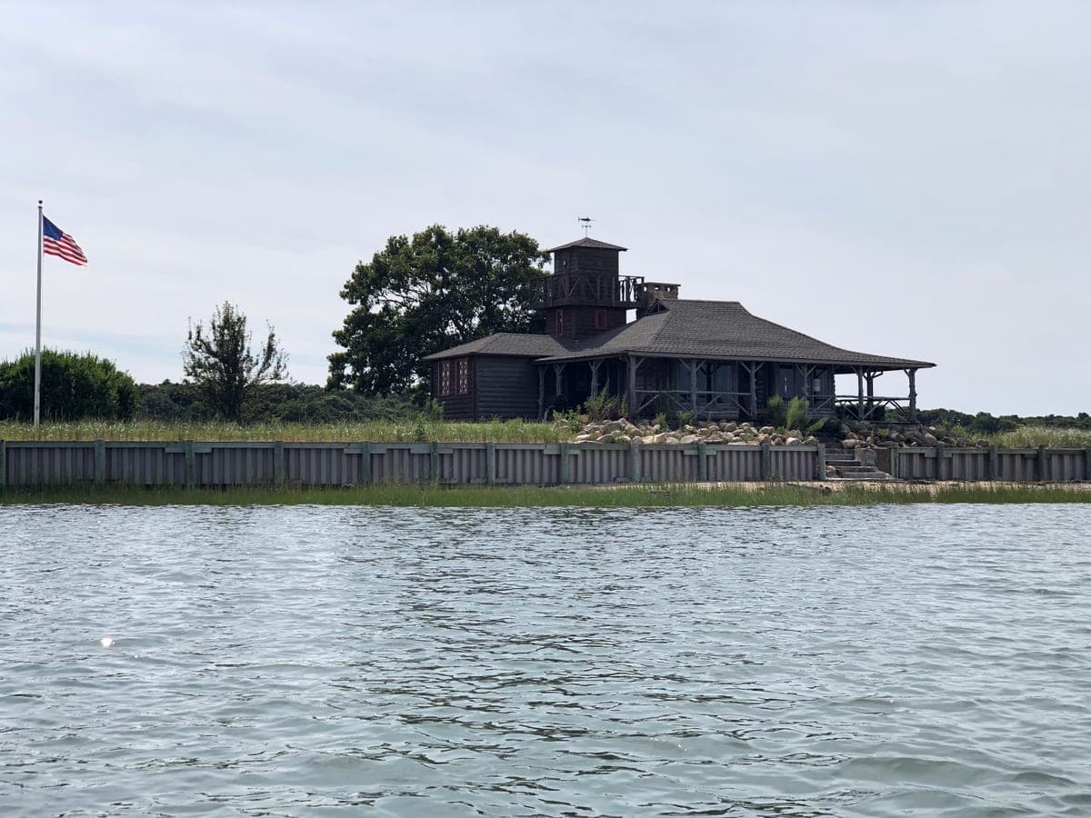 Commons file captioned 'Smith Taylor cabin, Shelter Island' and geotagged 41.06989,-72.29814 — 70 m from this record's stored coordinate, consistent with a small island shot from the water.